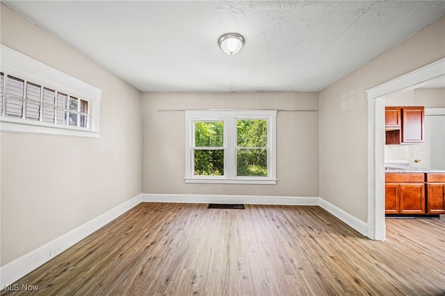12525 Lancelot Ave, Cleveland, OH 44108 - spare room with wood finished floors