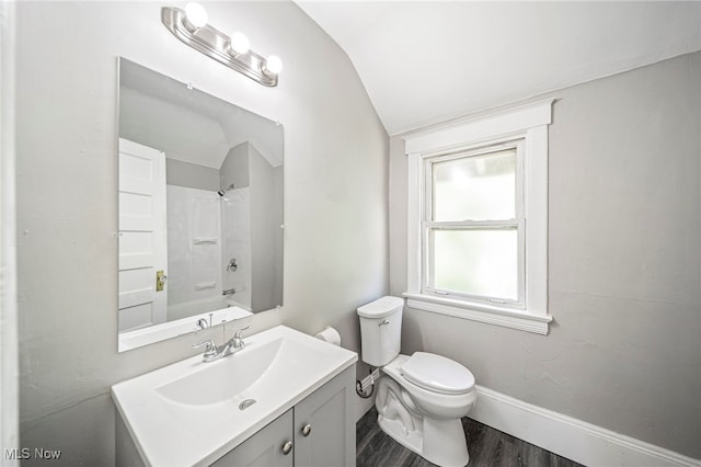 12525 Lancelot Ave, Cleveland, OH 44108 - full bathroom with vaulted ceiling, vanity, and wood finished floors