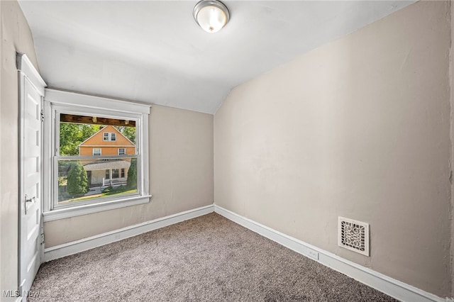 12525 Lancelot Ave, Cleveland, OH 44108 - carpeted spare room with lofted ceiling and baseboards