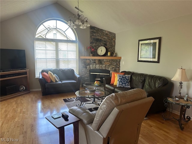 5-118 The Flds, Williamstown, WV 26187 - living room with vaulted ceiling, wood finished floors, and a fireplace