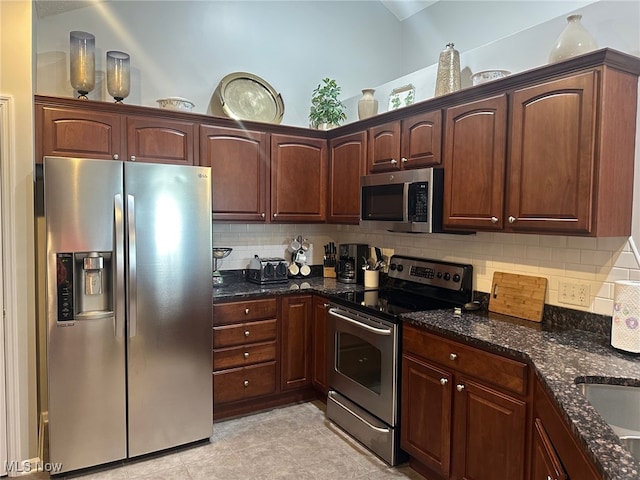 5-118 The Flds, Williamstown, WV 26187 - kitchen with stainless steel appliances, tasteful backsplash, and dark stone counters