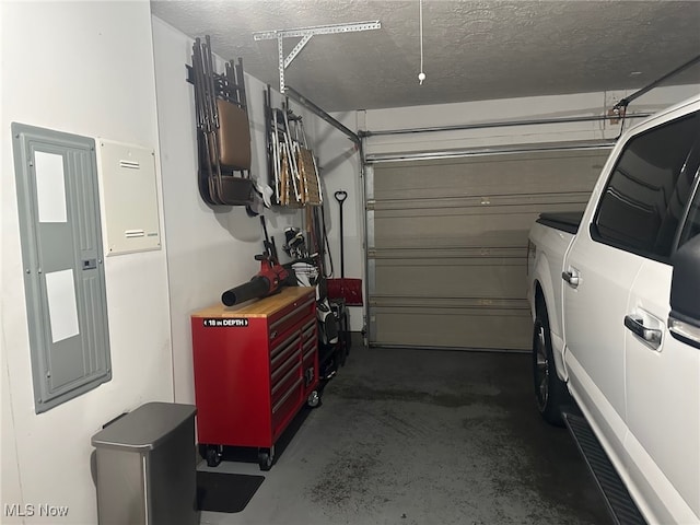 5-118 The Flds, Williamstown, WV 26187 - garage with washer and clothes dryer and electric panel