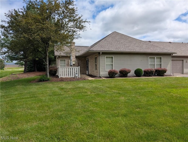 4220 Tannybrooke Ln NW Unit 13C, Canton, OH 44718 - view of front of property with roof with shingles, an attached garage, and a front yard