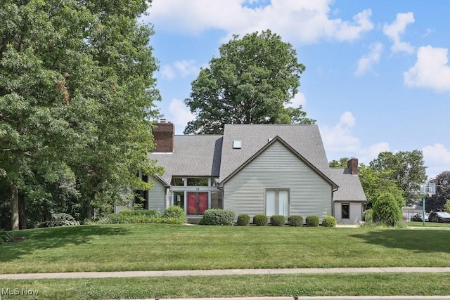118 Steeplechase Ln, Munroe Falls, OH 44262 - view of front of home featuring a chimney and a front yard