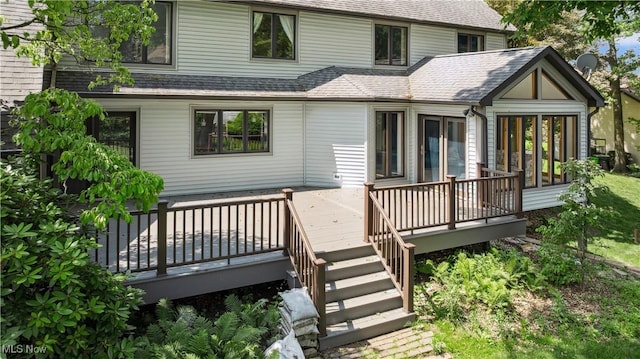 118 Steeplechase Ln, Munroe Falls, OH 44262 - back of house featuring a wooden deck, a shingled roof, and a sunroom