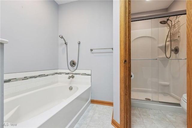 118 Steeplechase Ln, Munroe Falls, OH 44262 - bathroom featuring a stall shower, a bath, and tile patterned flooring