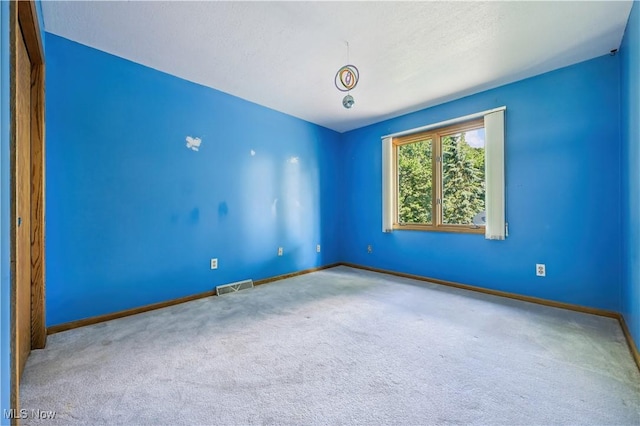 118 Steeplechase Ln, Munroe Falls, OH 44262 - carpeted spare room featuring baseboards