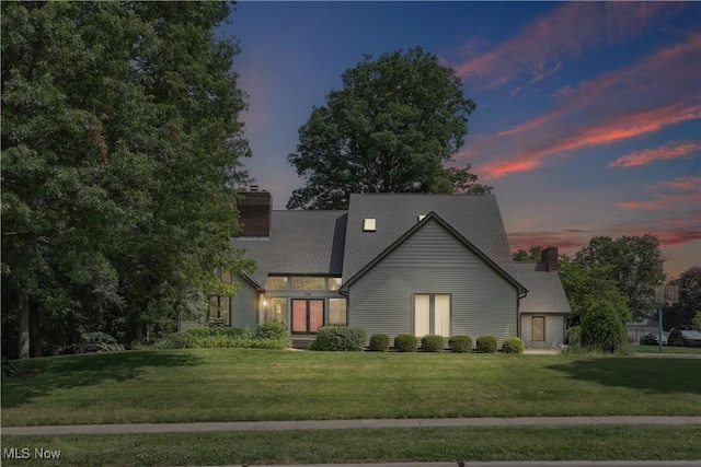 118 Steeplechase Ln, Munroe Falls, OH 44262 - view of front facade with a chimney and a yard
