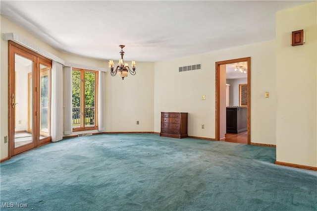 118 Steeplechase Ln, Munroe Falls, OH 44262 - carpeted empty room with a chandelier and baseboards