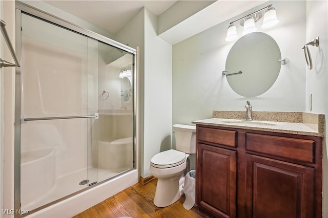 118 Steeplechase Ln, Munroe Falls, OH 44262 - bathroom with a stall shower, vanity, and wood finished floors