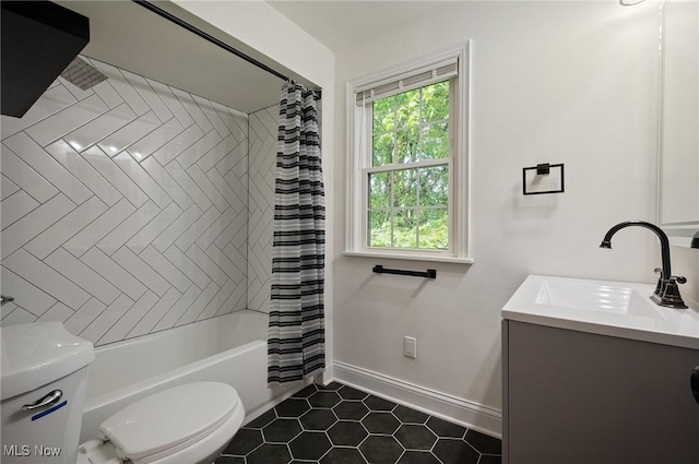 3722 Avalon Rd, Shaker Heights, OH 44120 - bathroom featuring vanity, shower / tub combo with curtain, and tile patterned floors