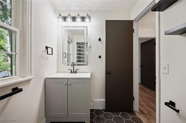 3722 Avalon Rd, Shaker Heights, OH 44120 - bathroom featuring vanity and wood finished floors