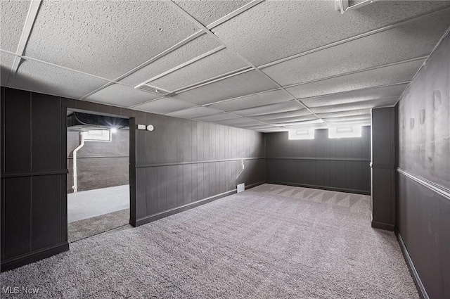 3722 Avalon Rd, Shaker Heights, OH 44120 - basement with a drop ceiling, carpet floors, and wood walls