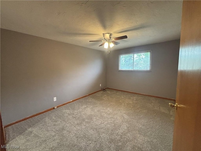 25320 Clubside Dr Unit 6, North Olmsted, OH 44070 - unfurnished room featuring carpet floors, a ceiling fan, and a textured ceiling