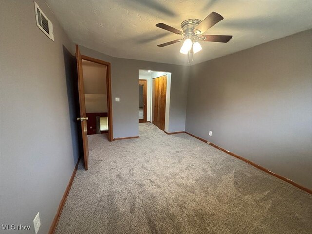 25320 Clubside Dr Unit 6, North Olmsted, OH 44070 - unfurnished bedroom with light colored carpet, ceiling fan, and a closet