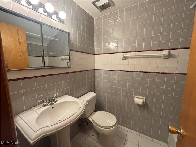 25320 Clubside Dr Unit 6, North Olmsted, OH 44070 - half bath featuring tile walls and tile patterned flooring