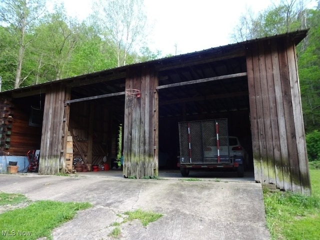 1389 Middle Fork Rd, Millstone, WV 25261 - view of pole building featuring a carport and concrete driveway