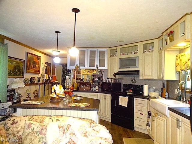 1389 Middle Fork Rd, Millstone, WV 25261 - kitchen featuring black electric range, dark countertops, glass insert cabinets, cream cabinetry, and crown molding