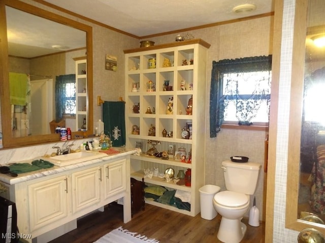 1389 Middle Fork Rd, Millstone, WV 25261 - bathroom with crown molding, wallpapered walls, vanity, and wood finished floors