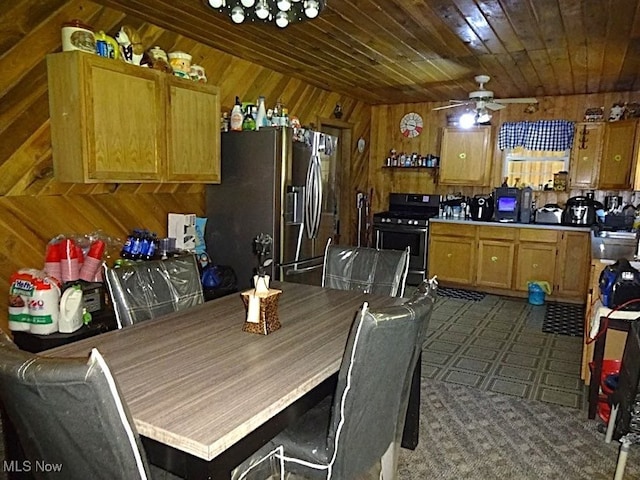 1389 Middle Fork Rd, Millstone, WV 25261 - dining space featuring wood walls, ceiling fan, wooden ceiling, and dark carpet