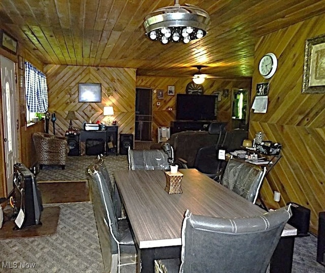 1389 Middle Fork Rd, Millstone, WV 25261 - dining room with a ceiling fan, carpet, wooden walls, and wood ceiling
