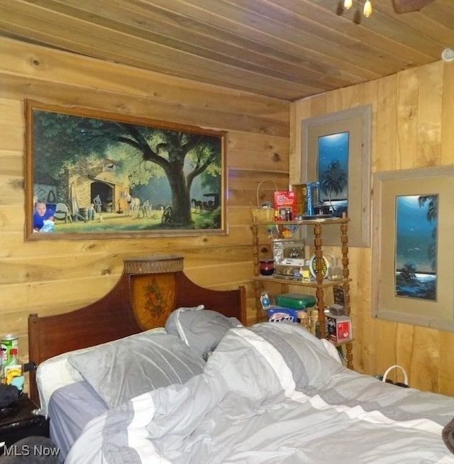 1389 Middle Fork Rd, Millstone, WV 25261 - bedroom with wood walls and wooden ceiling