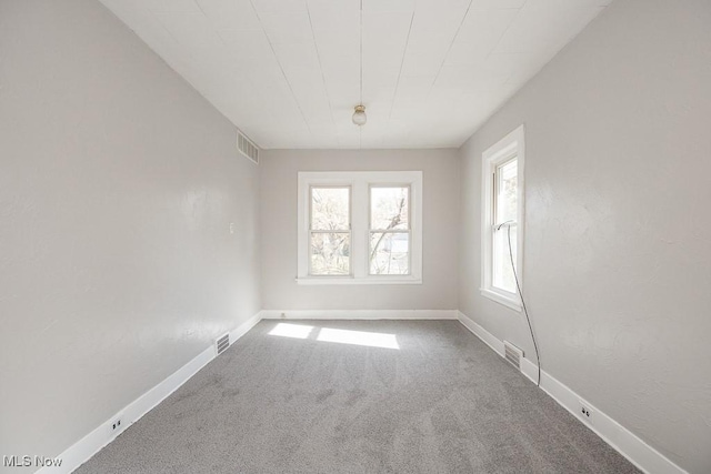 1258 Lily St, Akron, OH 44301 - spare room with carpet floors and baseboards