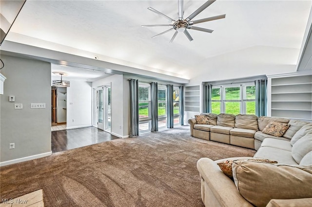 1130 Dairy Ln, East Liverpool, OH 43920 - living area with carpet flooring, a ceiling fan, built in shelves, and vaulted ceiling