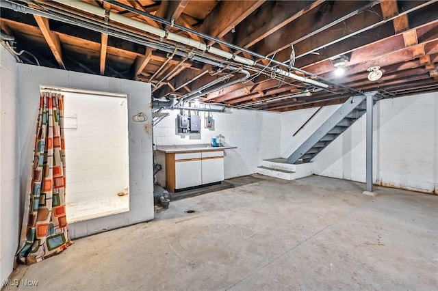 1130 Dairy Ln, East Liverpool, OH 43920 - unfinished below grade area featuring stairway, concrete block wall, and electric panel