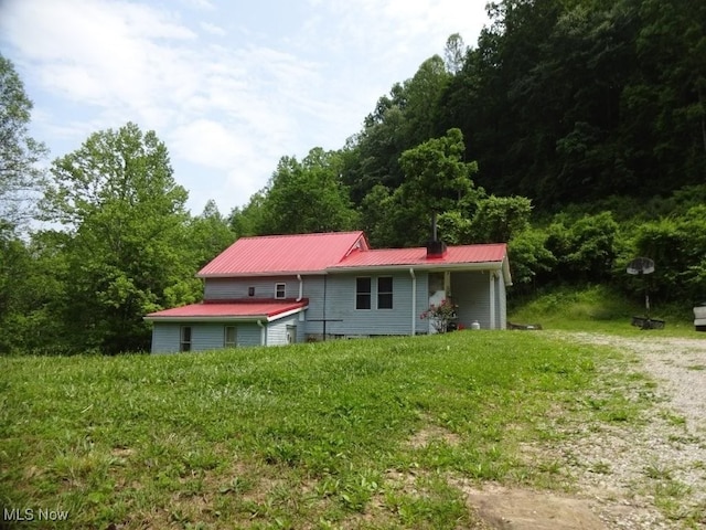 8710 Clay Rd, Left Hand, WV 25251 - back of property with a metal roof