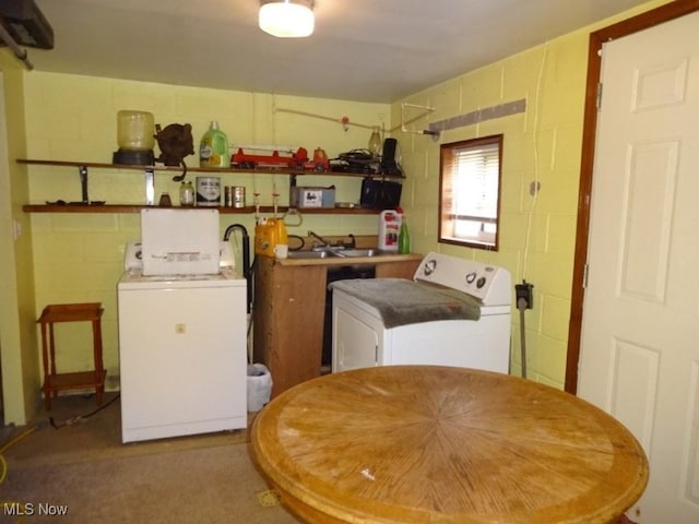 8710 Clay Rd, Left Hand, WV 25251 - laundry room featuring concrete block wall and washer and clothes dryer