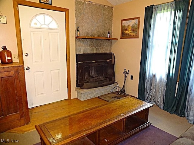 8710 Clay Rd, Left Hand, WV 25251 - living area featuring a stone fireplace