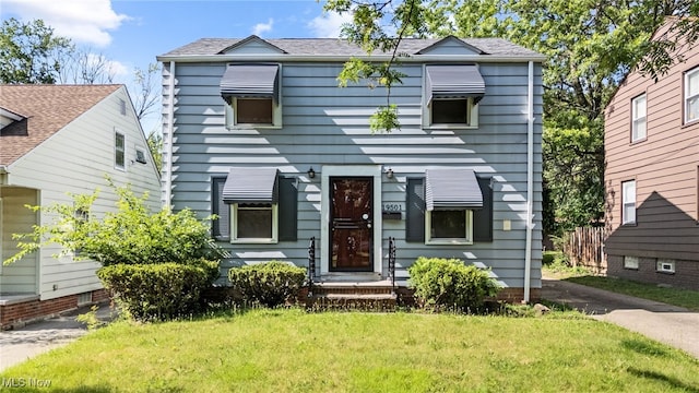 19501 Libby Rd, Maple Heights, OH 44137 - townhome / multi-family property with a front yard