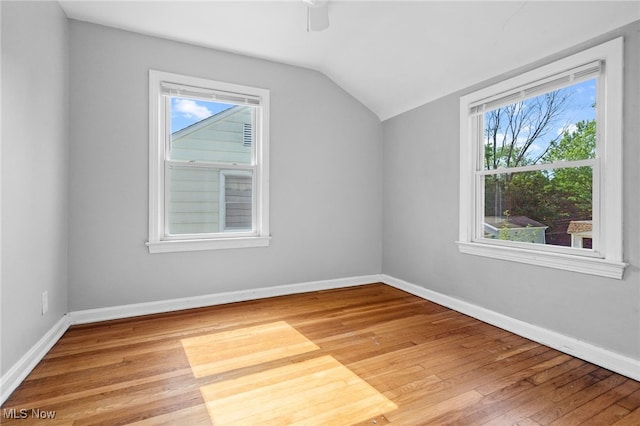 19501 Libby Rd, Maple Heights, OH 44137 - additional living space with lofted ceiling, hardwood / wood-style floors, and ceiling fan