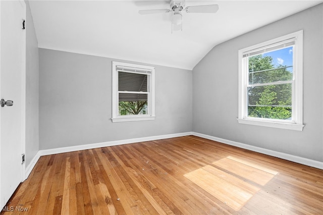 19501 Libby Rd, Maple Heights, OH 44137 - bonus room featuring vaulted ceiling, healthy amount of natural light, hardwood / wood-style floors, and ceiling fan