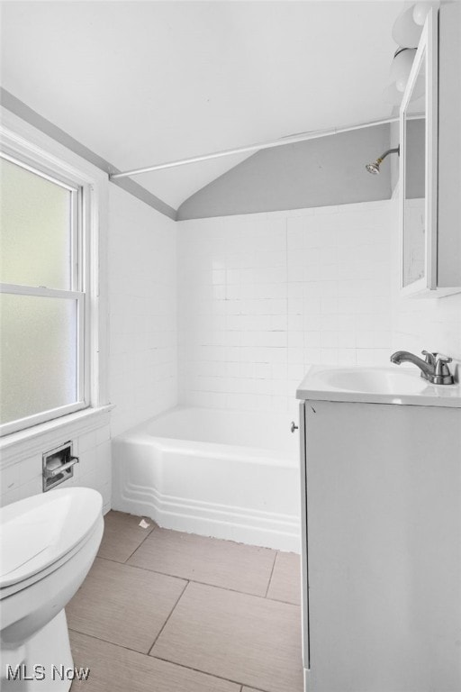 19501 Libby Rd, Maple Heights, OH 44137 - bathroom with vanity and tile walls
