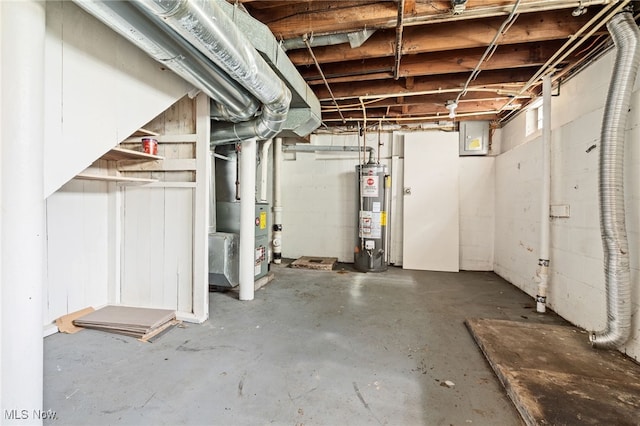 19501 Libby Rd, Maple Heights, OH 44137 - unfinished below grade area featuring water heater, heating unit, and electric panel