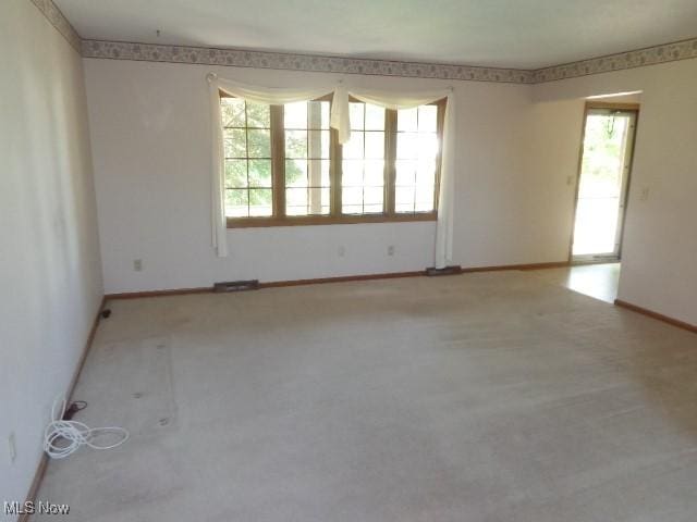 4326 Wood Thrush Dr, Parma, OH 44134 - empty room featuring healthy amount of natural light