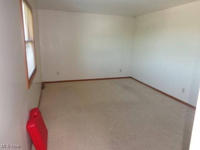 4326 Wood Thrush Dr, Parma, OH 44134 - carpeted spare room with baseboards