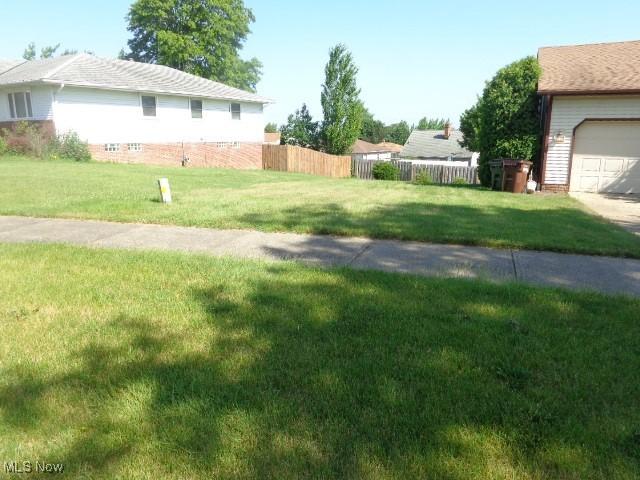 4326 Wood Thrush Dr, Parma, OH 44134 - view of yard with a garage