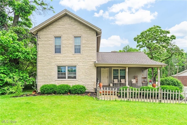 337 Youngstown Kingsville Rd SE, Vienna, OH 44473 - traditional-style home featuring stone siding and covered porch