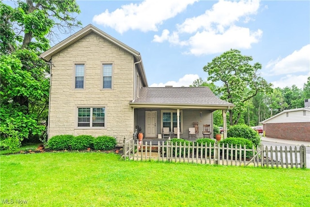 337 Youngstown Kingsville Rd SE, Vienna, OH 44473 - view of front of property with stone siding, covered porch, and a shingled roof