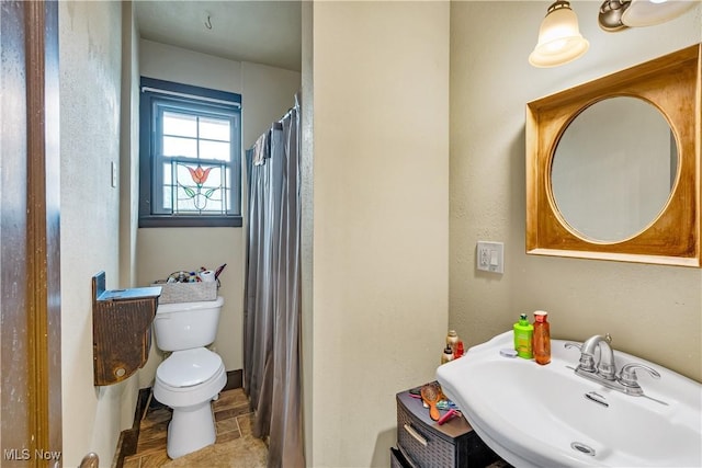 337 Youngstown Kingsville Rd SE, Vienna, OH 44473 - bathroom featuring a sink and toilet