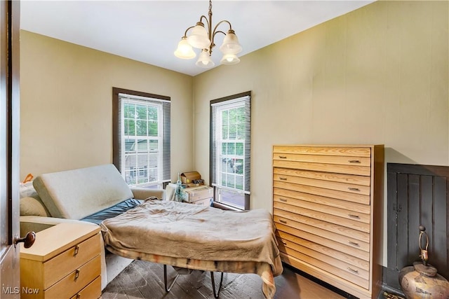 337 Youngstown Kingsville Rd SE, Vienna, OH 44473 - bedroom with a chandelier and wood finished floors
