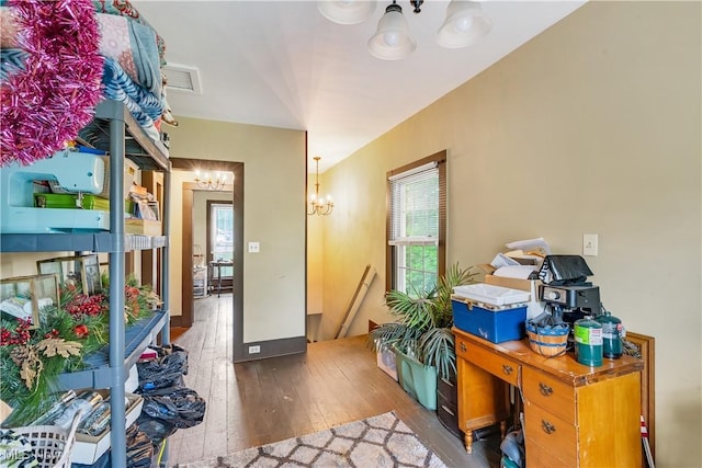337 Youngstown Kingsville Rd SE, Vienna, OH 44473 - foyer entrance featuring a chandelier, wood-type flooring, and plenty of natural light