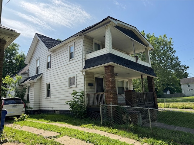 1185 E 74th St, Cleveland, OH 44103 - view of front facade with covered porch, a shingled roof, and a balcony