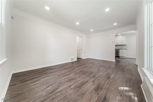 17207 Maple Heights Blvd, Maple Heights, OH 44137 - spare room featuring dark wood-style flooring and recessed lighting