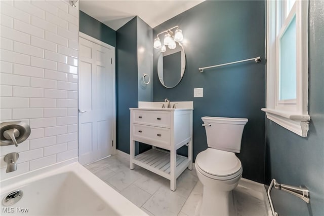 17207 Maple Heights Blvd, Maple Heights, OH 44137 - bathroom featuring marble look tile flooring and vanity