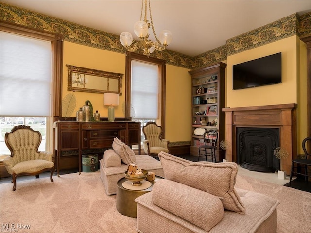 203 W 6th St, Dover, OH 44622 - sitting room featuring a chandelier, a fireplace with flush hearth, and carpet
