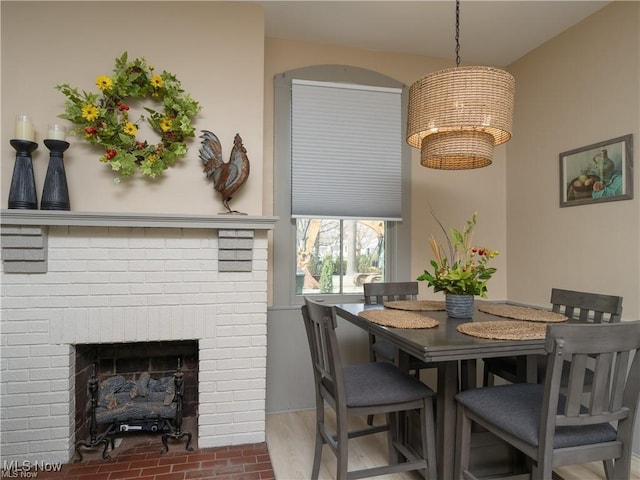203 W 6th St, Dover, OH 44622 - dining space featuring a fireplace